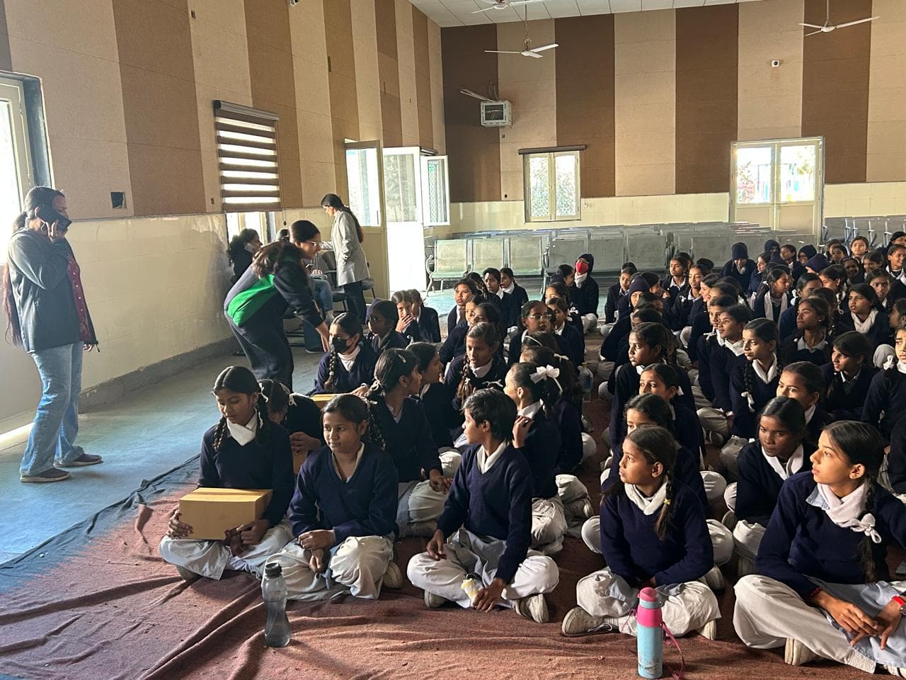 A hall full of schoolgirls at an EmpowerHer session