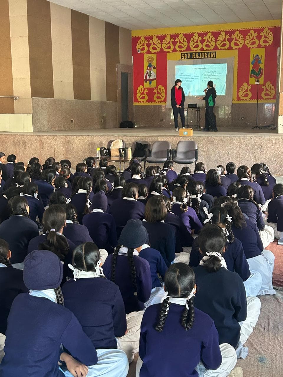 An EmpowerHer session presenting product usage to students